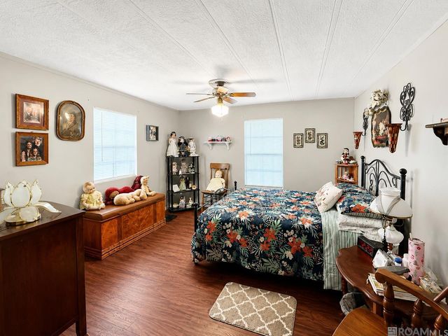 21042 Holmes Dr, Central, LA 70791