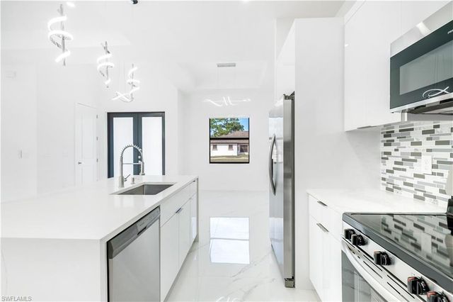 606 Johns AVE, Lehigh Acres, FL 33972