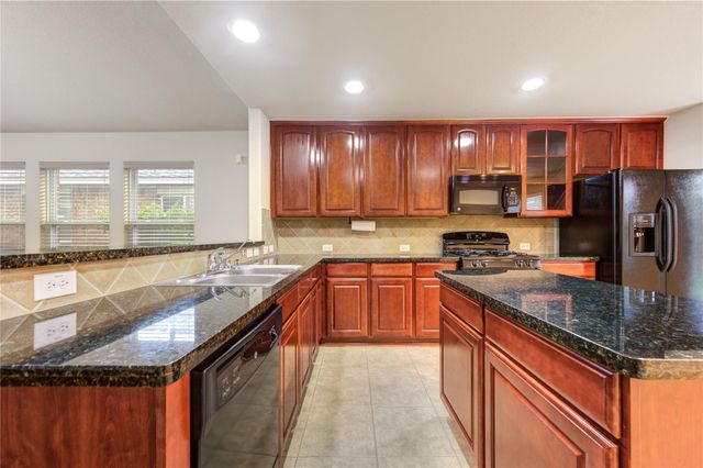 16702 Grovetrail Lane, Spring, TX 77379