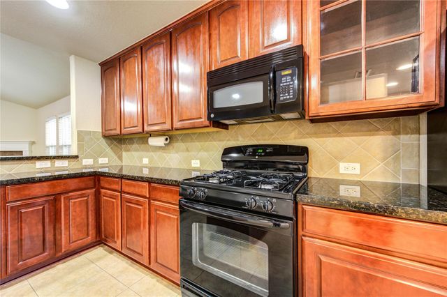 16702 Grovetrail Lane, Spring, TX 77379