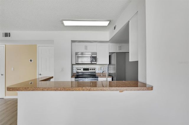 413 FOUNTAINHEAD CIRCLE 132, Kissimmee, FL 34741