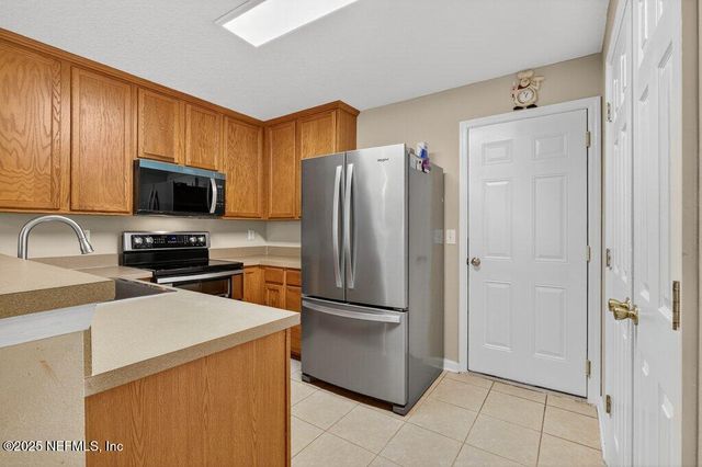 1500 CALMING WATER Drive, 403, Fleming Island, FL 32003