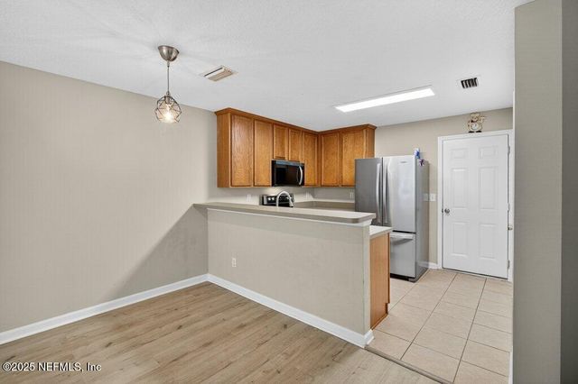 1500 CALMING WATER Drive, 403, Fleming Island, FL 32003