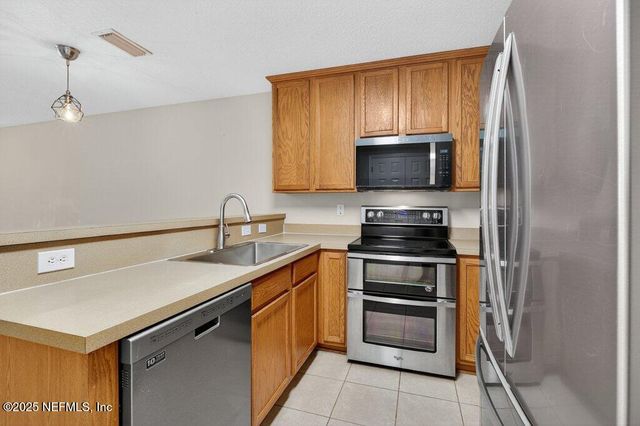 1500 CALMING WATER Drive, 403, Fleming Island, FL 32003