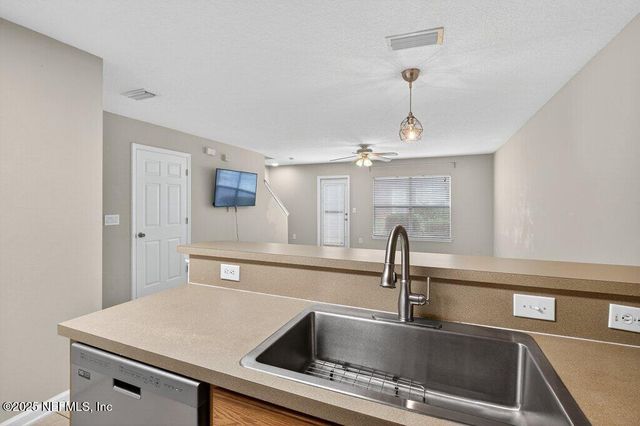 1500 CALMING WATER Drive, 403, Fleming Island, FL 32003