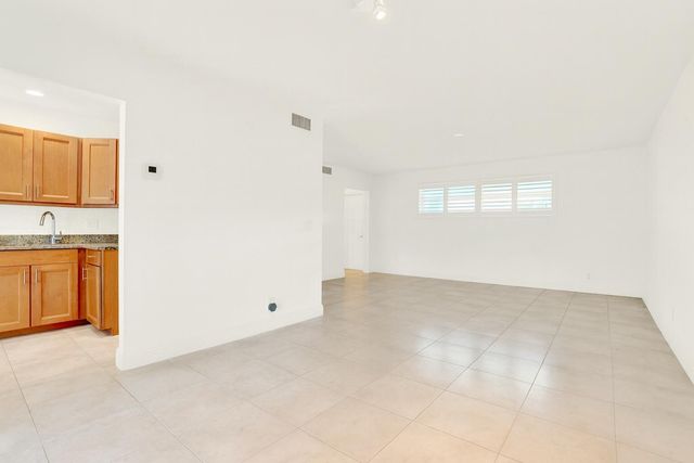 32 Colonial Club Drive 203, Boynton Beach, FL 33435