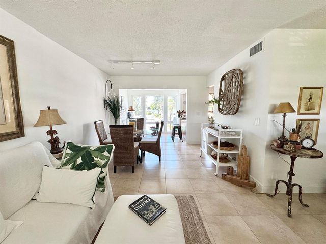 32 Colonial Club Drive 203, Boynton Beach, FL 33435