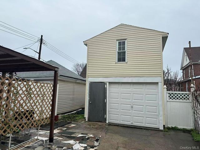 9703 105th Street, Ozone Park, NY 11416