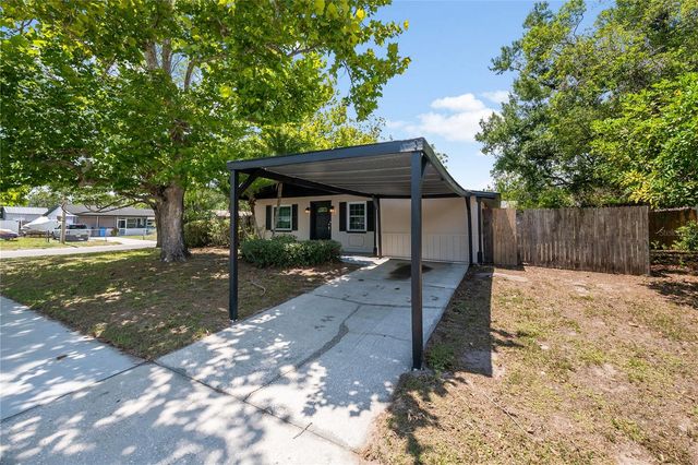 7402 WISHING WELL COURT, Tampa, FL 33619