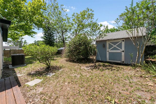 7402 WISHING WELL COURT, Tampa, FL 33619