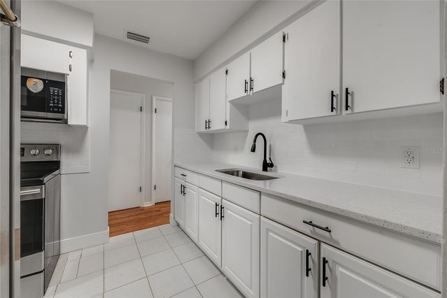 7402 WISHING WELL COURT, Tampa, FL 33619