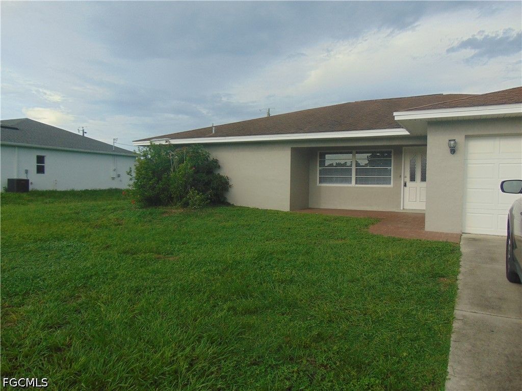 119 Riviera ST, Lehigh Acres, FL 33936