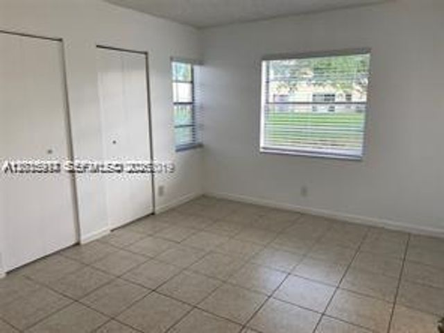 895 Twin Lakes Dr 1-F, Coral Springs, FL 33071