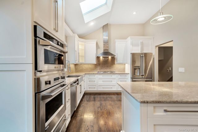 1499 Eric Lane, East Meadow, NY 11554