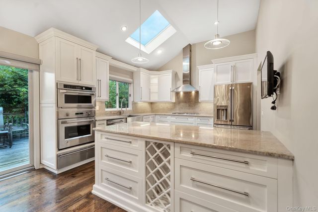 1499 Eric Lane, East Meadow, NY 11554