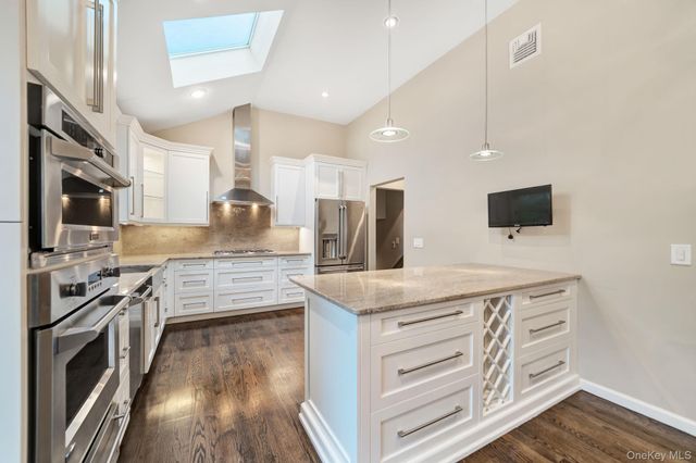1499 Eric Lane, East Meadow, NY 11554