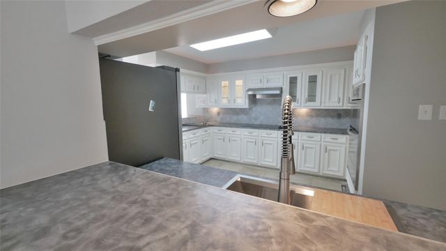 8003 Oakwood Forest Drive, Houston, TX 77040