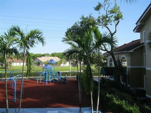 8781 Wiles Road 203, Coral Springs, FL 33067