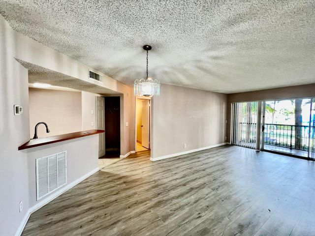 8781 Wiles Road 203, Coral Springs, FL 33067