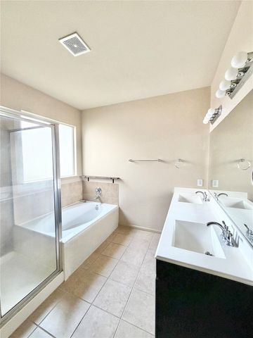 25410 Saddlebrook Champion Way, Tomball, TX 77375