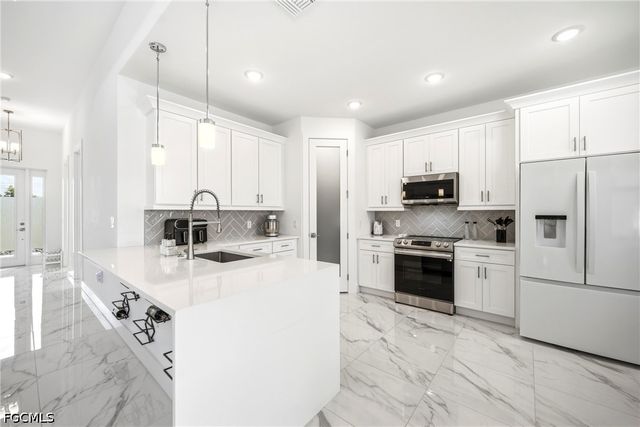 310 NW 14th ST, Cape Coral, FL 33993