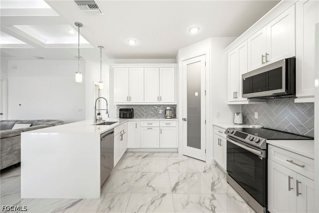 310 NW 14th ST, Cape Coral, FL 33993