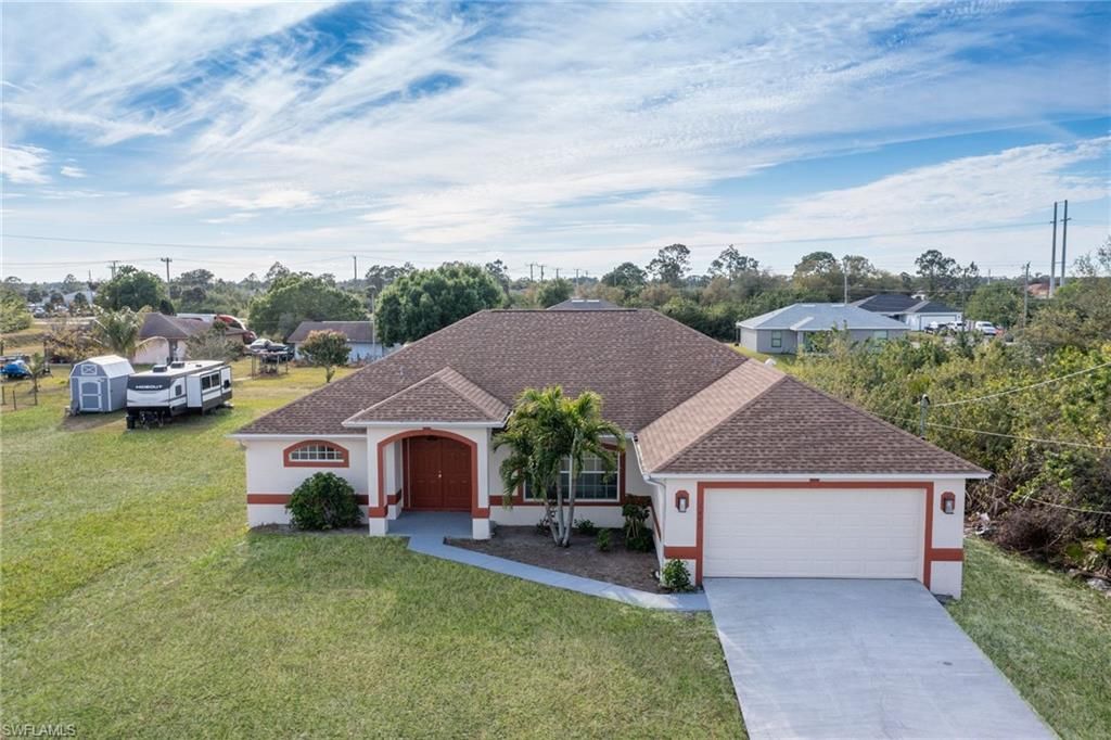 1402 FRED AVE S, LEHIGH ACRES, FL 33976 — exterior