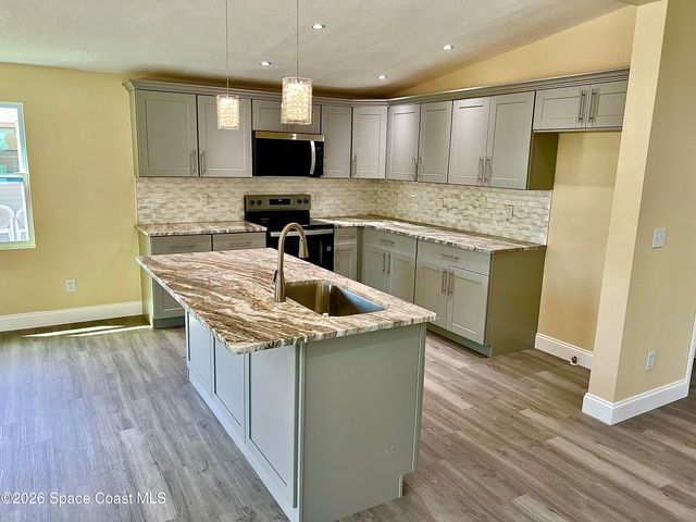 1213 Iriquois Drive, Barefoot Bay, FL 32976