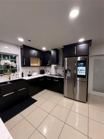 1305 E LOUISE AVENUE, Tampa, FL 33603