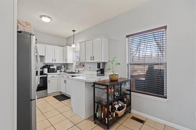 12508 Fountain Lake Drive, Grandview, MO 64030