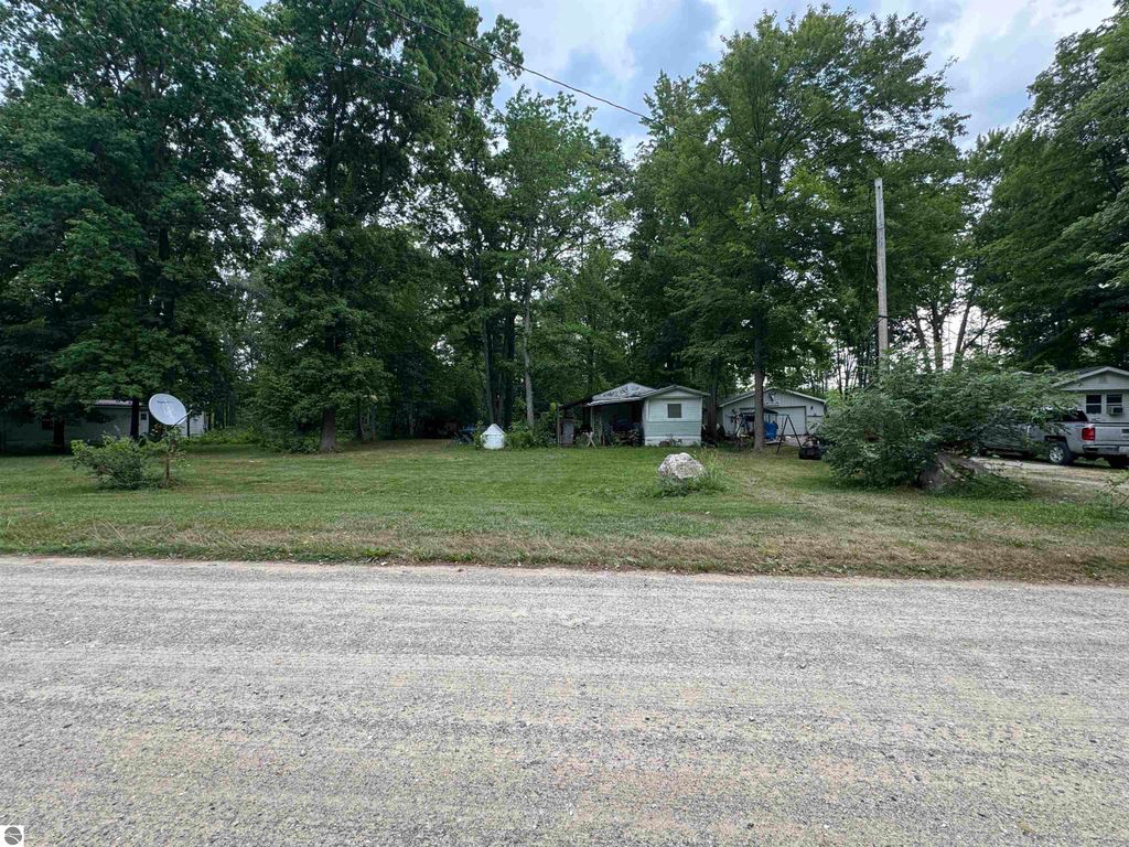 Image 1 of property listing at 7645 Windoga Lake Drive, Weidman, MI 48893