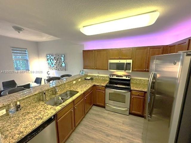 11403 NW 89th St 208, Doral, FL 33178