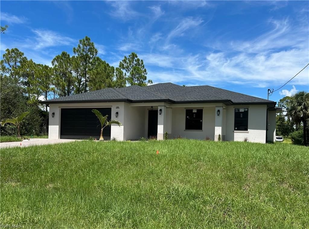 3110 17th ST W, LEHIGH ACRES, FL 33971 — photo 3
