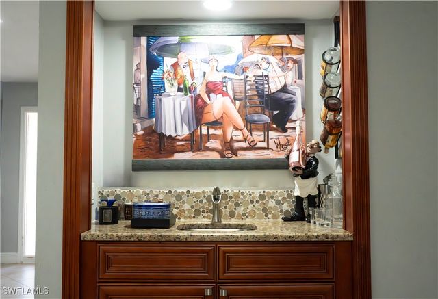 233 Baltusrol DR, Naples, FL 34113