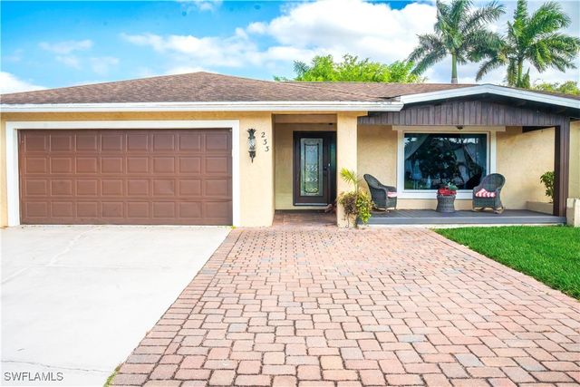 233 Baltusrol DR, Naples, FL 34113