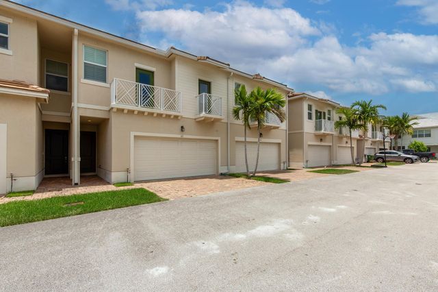 63 Dogwood Court, Royal Palm Beach, FL 33411