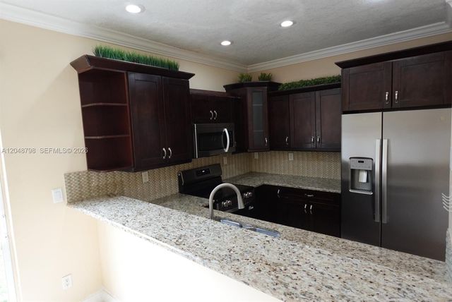 16102 NW 22nd Street, Pembroke Pines, FL 33028