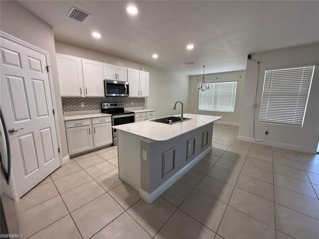 635 NE 6th PL, CAPE CORAL, FL 33909 — photo 2