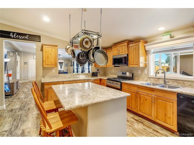 120 Juniper Cir, Log Lane Village, CO 80705