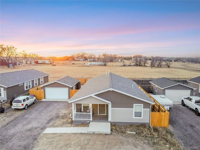 120 Juniper Cir, Log Lane Village, CO 80705