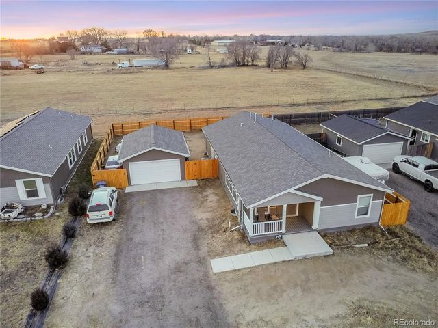 120 Juniper Cir, Log Lane Village, CO 80705