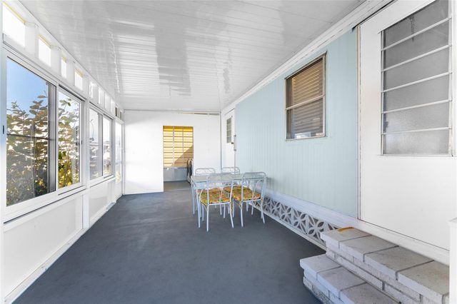 1891 ENGLEWOOD ROAD 11, Englewood, FL 34223