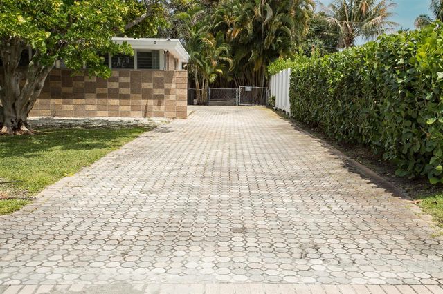 7306 Clarke Road, Lake Clarke Shores, FL 33406