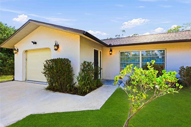 2091 CANNOLOT BOULEVARD, Port Charlotte, FL 33948