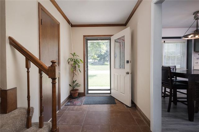 404 S SUNSET Lane, Raymore, MO 64083