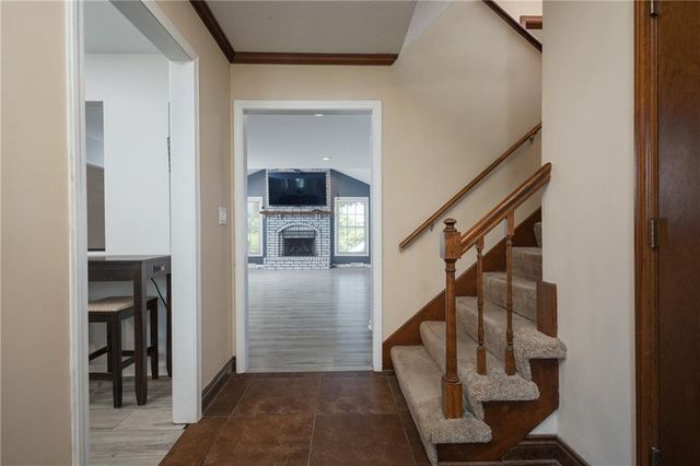 404 S SUNSET Lane, Raymore, MO 64083