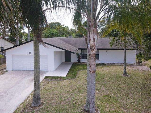 430 La Mancha Avenue, Royal Palm Beach, FL 33411