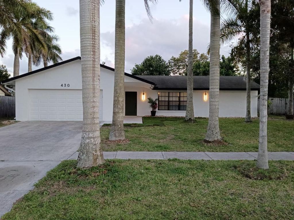 430 La Mancha Avenue, Royal Palm Beach, FL 33411