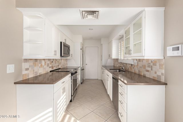 9871 W COUNTRY CLUB Court, Sun City, AZ 85373