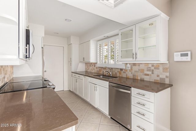 9871 W COUNTRY CLUB Court, Sun City, AZ 85373